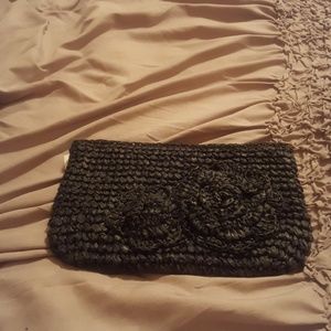 Black straw clutch